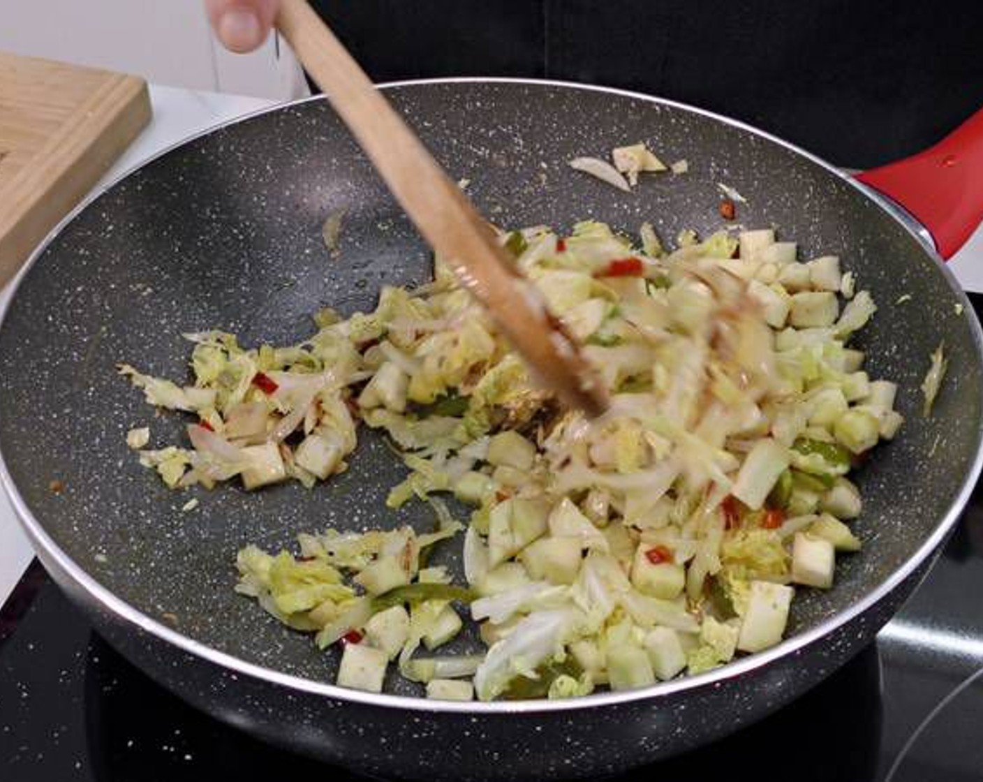 step 8 Add into the pan the napa cabbage and cubed eggplant. Season again with Salt (to taste). Mix well and leave in the pan until the veggies are all cooked.