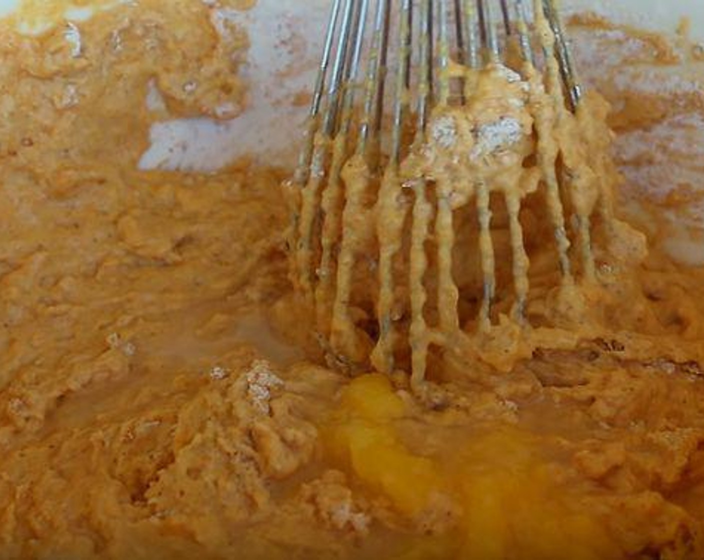 step 2 In a large jug or medium mixing bowl whisk together Canned Pumpkin Purée (1 cup), Buttermilk (1 1/2 cups), Farmhouse Eggs® Large Brown Eggs (2), and Vanilla Extract (1 tsp) until well combined. Pour into dry ingredients and whisk just until combined - don't over-mix. Stir in melted Butter (3 Tbsp). Let batter rest until you make the praline sauce or 5 minutes.