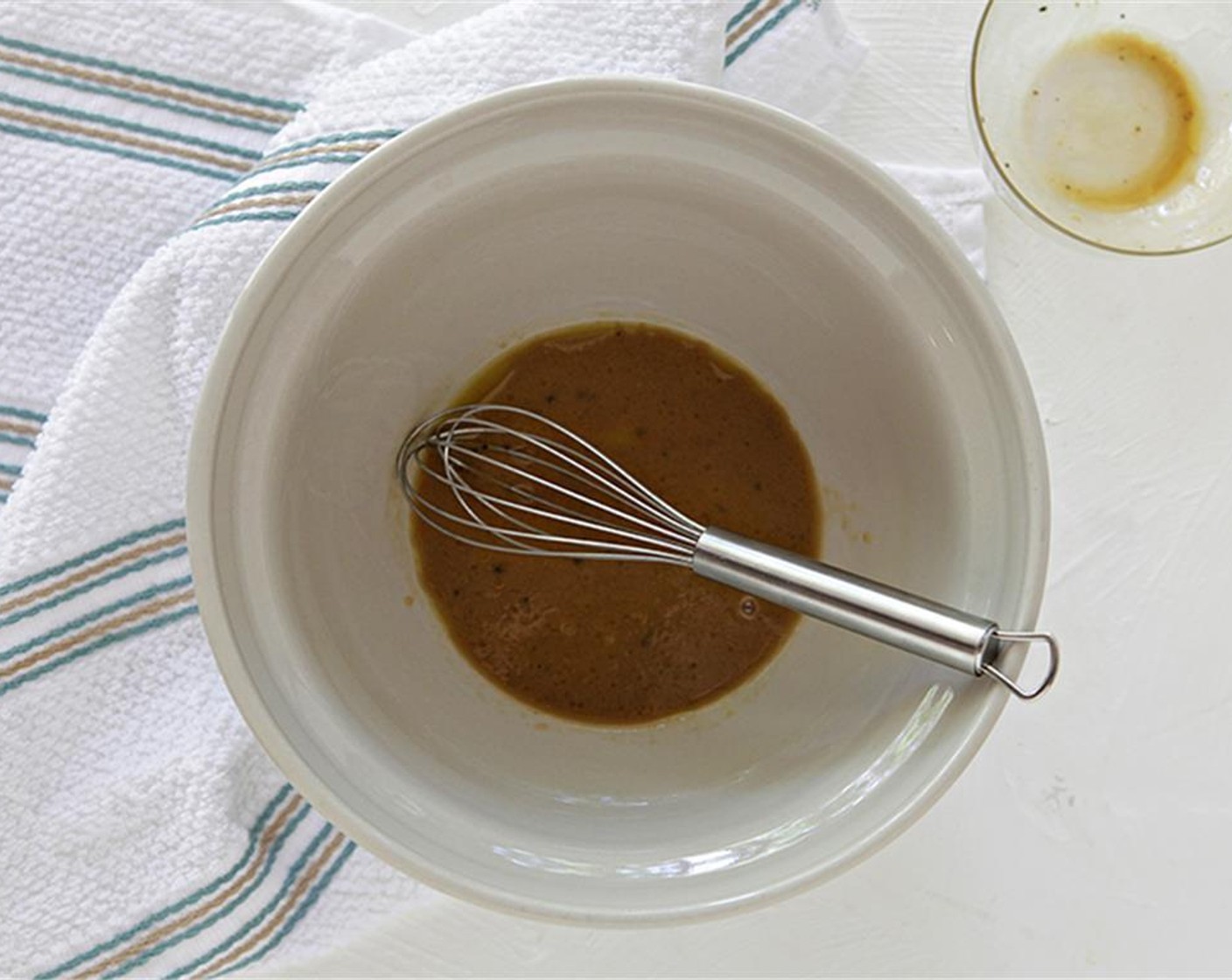 step 6 In the reserved mixing bowl, combine Dijon Mustard (1 tsp), Sherry Vinegar (1/2 Tbsp), Honey (1 tsp), and a pinch of salt and pepper. Mix to combine and slowly add in remaining Extra-Virgin Olive Oil (1 Tbsp) while whisking.