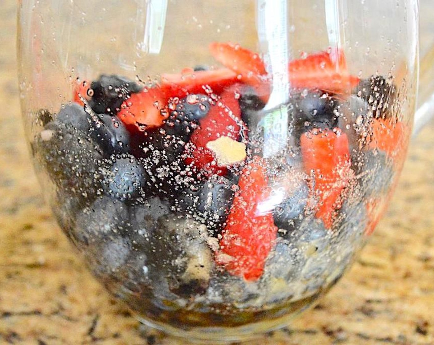 step 1 Combine the Fresh Blueberries (2 cups), Fresh Blackberries (2 cups), Fresh Strawberries (4) Granulated Sugar (4 Tbsp), and Pimm's (4 Tbsp) in a large pitcher. Stir them and let it all sit together in the refrigerator to draw out the juices and meld together for 3 hours at least, or up to overnight.