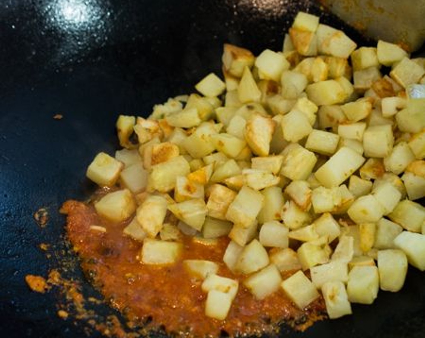 step 5 Add Granulated Sugar (1 Tbsp) then stir to dissolve. Add the potatoes. Stir to coat all of the potato cubes with sambal.