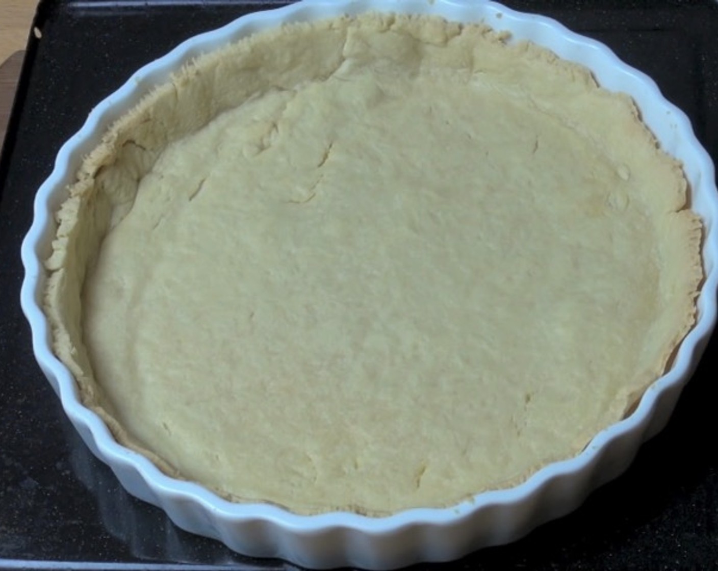 step 6 Remove pie weights and baking paper. Bake for another 5 minutes, or until golden. Set aside to cool.