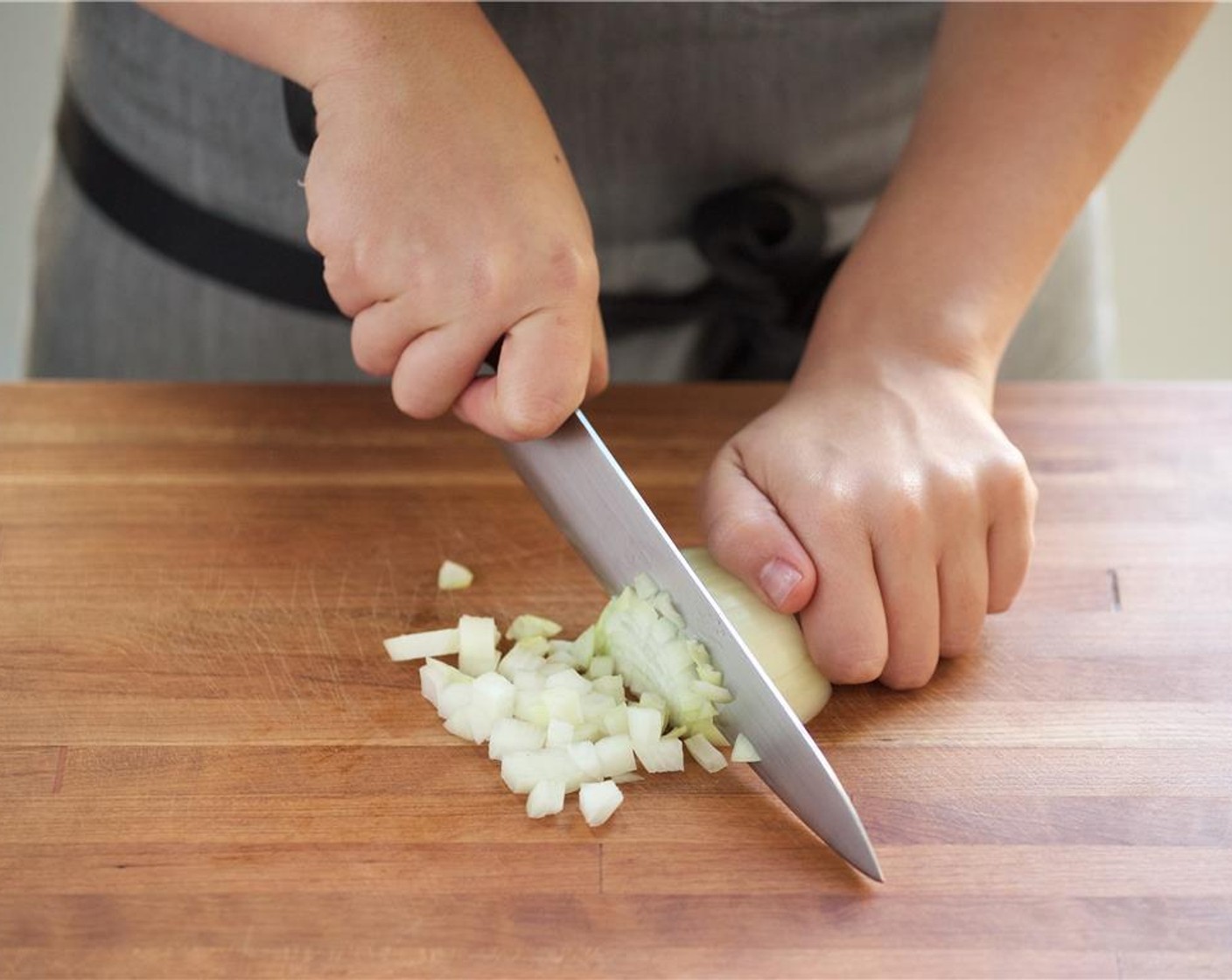 step 1 Peel and cut the Onion (1) into quarter inch diced pieces. Finely dice Shallot (1) into quarter inch diced pieces, and set aside.