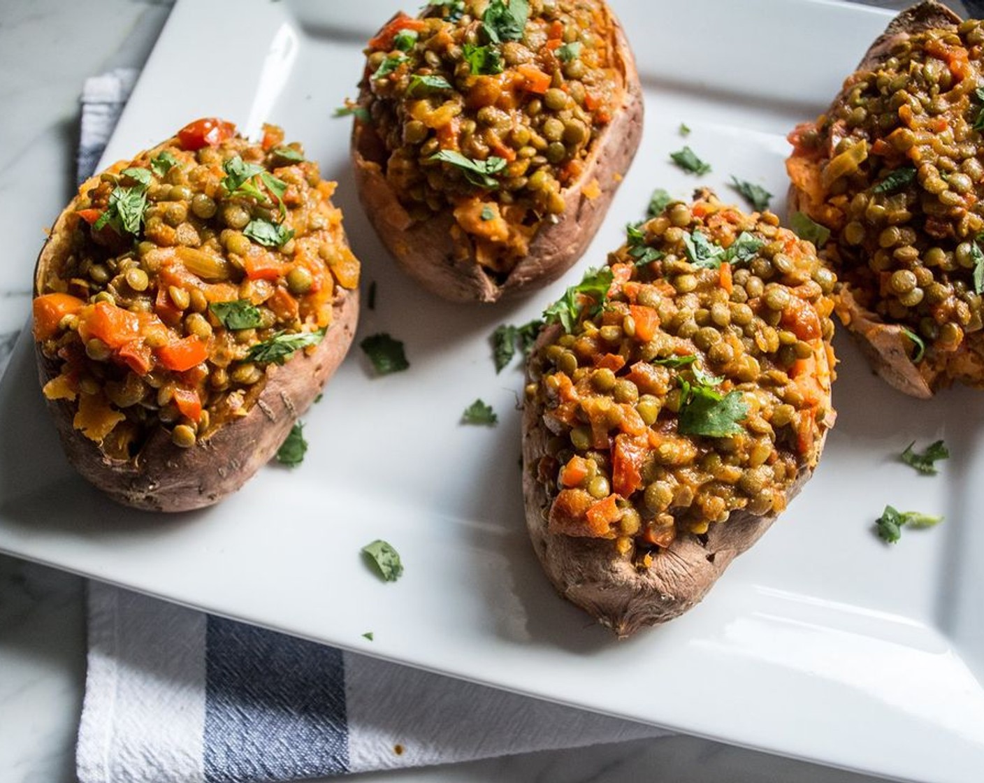 Vegan Lentil Curry Stuffed Sweet Potatoes