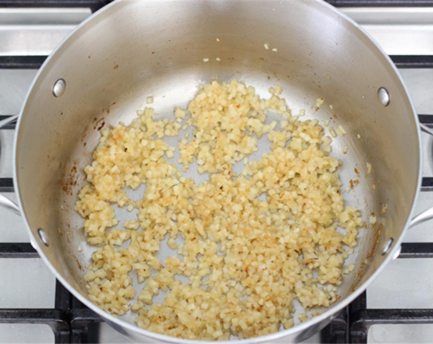 step 5 Drain most of the fat that was rendered off while browning the chicken, leaving behind about 2 tablespoons. Add the Onions (2) to that same pot, season with salt and ground black pepper ( to taste).