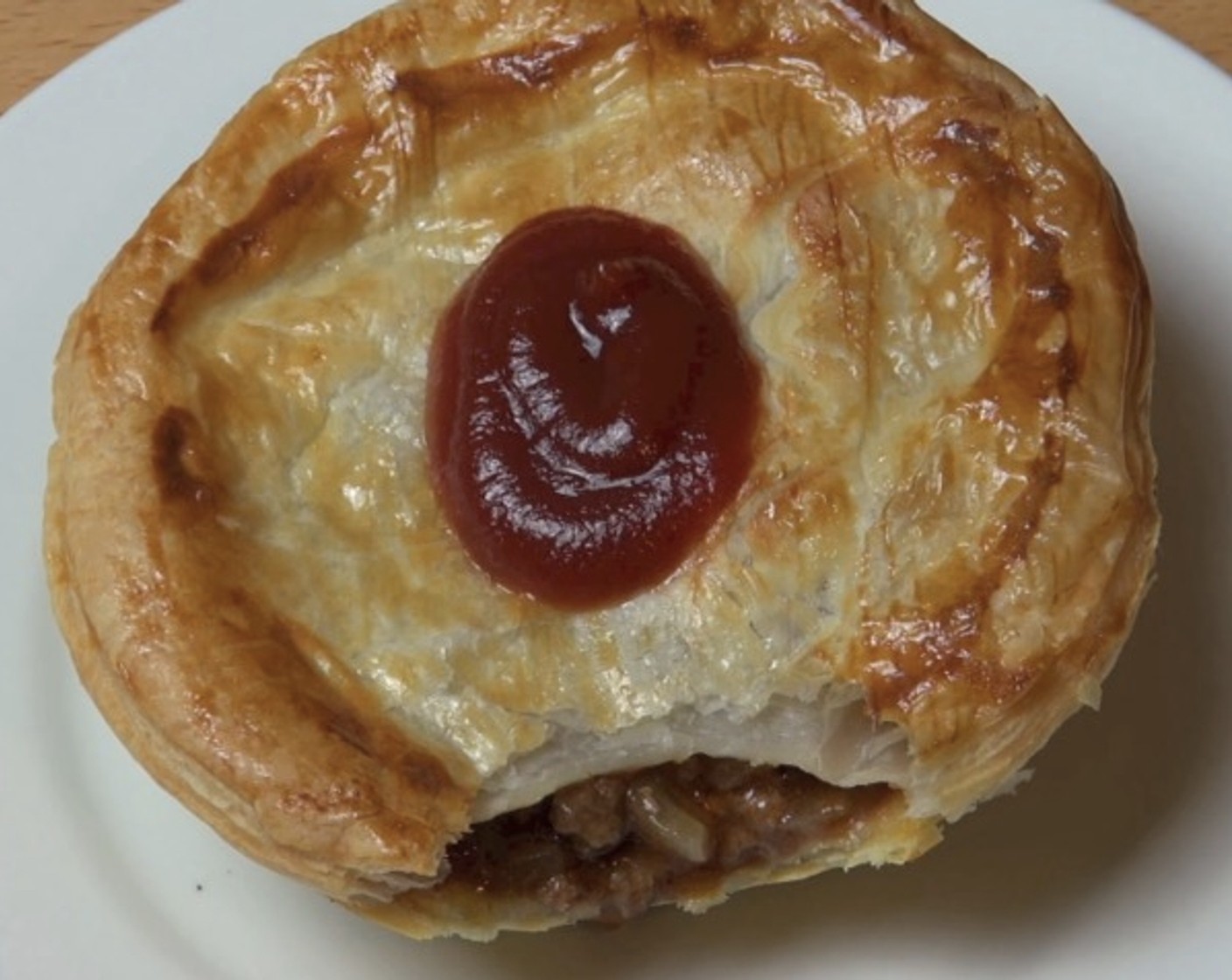 step 9 Top each pie with Tomato Sauce (to taste). Serve and enjoy!