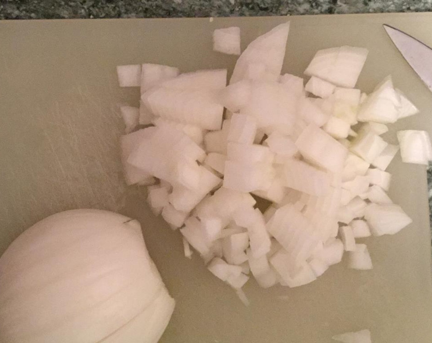 step 2 Dice the White Onion (1), and prepare the Garlic (1 clove).