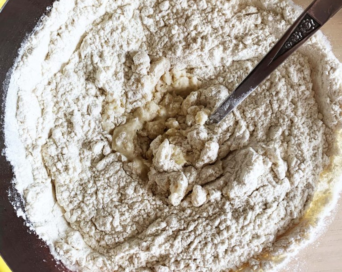 step 2 In a larger bowl dissolve poolish in Water (5 oz), add the remaining Type 0 Flour (1 1/4 cups), Spelt Flour (2/3 cup), Salt (1 tsp), and using a fork mix the ingredients together. Try to make movements that from the outside of the bowl, bring the dough toward the inside.