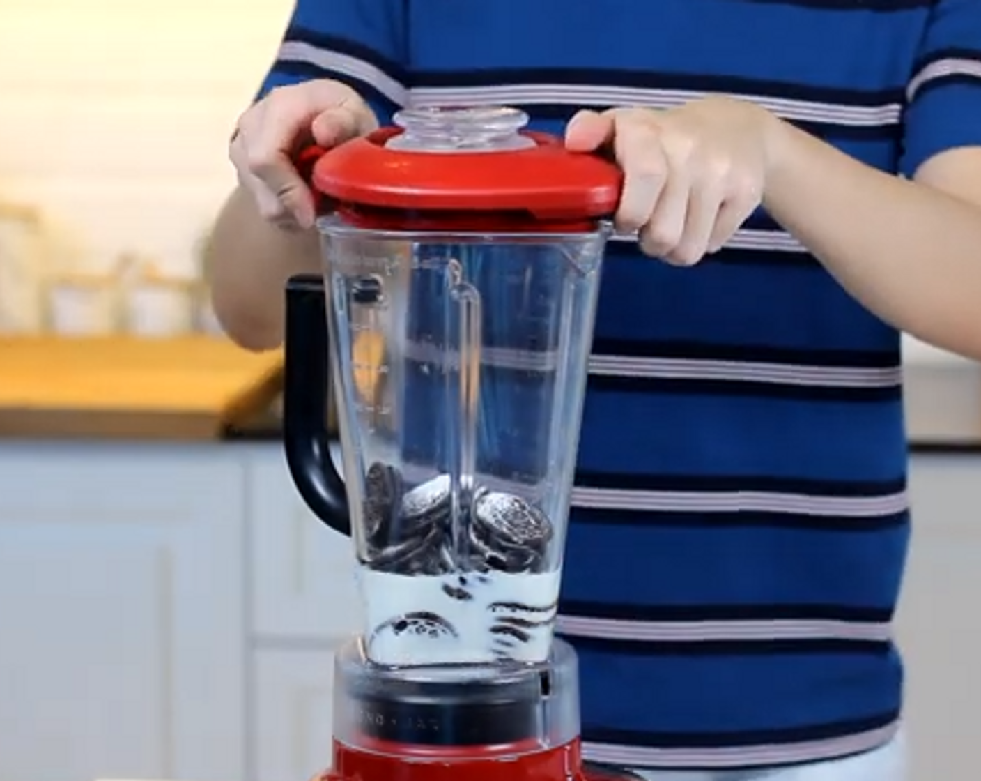 step 1 In a blender, add in Oreo® Chocolate Sandwich Cookies (3 cups), Milk (1 cup), and Baking Powder (1 tsp). Blend until smooth.