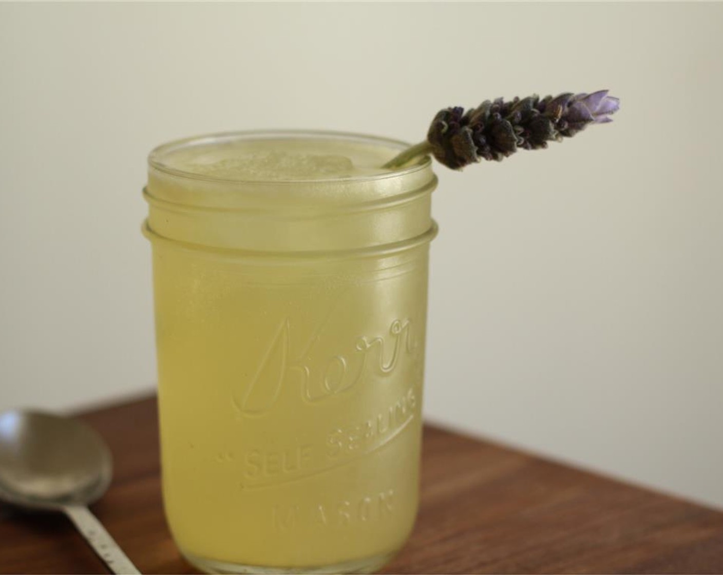 step 4 Stir for 30 seconds then strain into a lowball-sized glass. Top with Soda Water (to taste) and add a lavender sprig for garnish. Serve and enjoy!