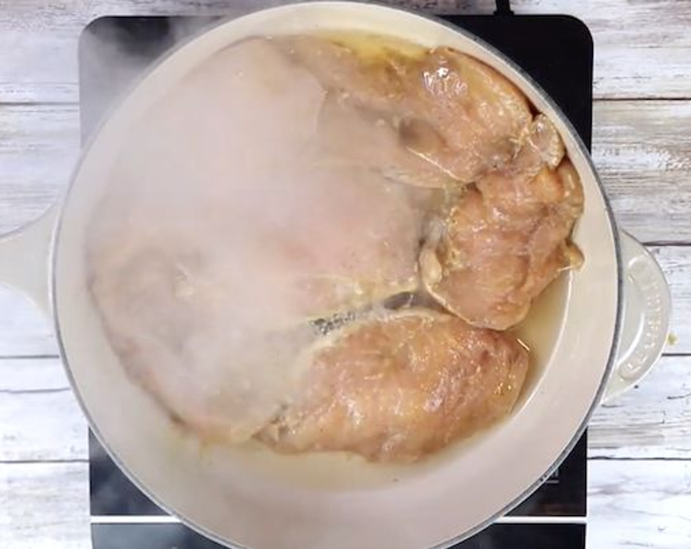 step 2 In a skillet, heat the Corn Oil (1/4 cup) over medium heat. Add the chicken, reserve the remaining marinade, and sauté until the meat is lightly browned. If needed, add a bit of water to the leftover marinade and add to the chicken if it's drying out and not fully cooked.