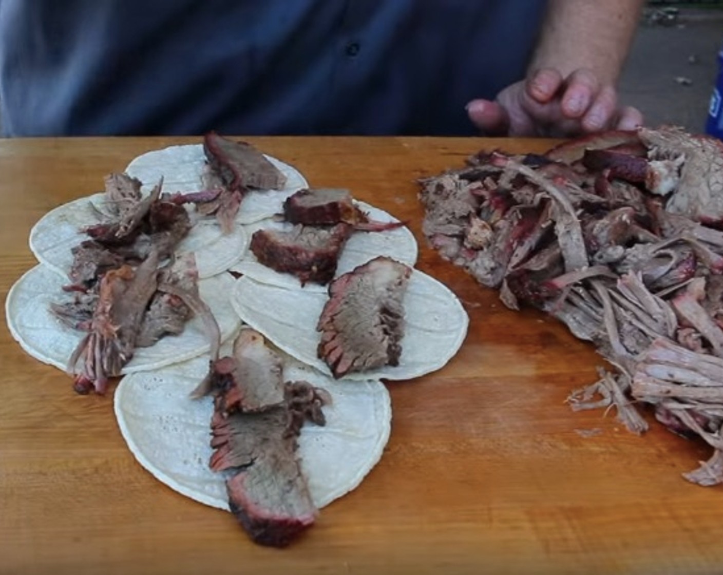 step 12 Top each tortilla with a slice of brisket or with shredded point.