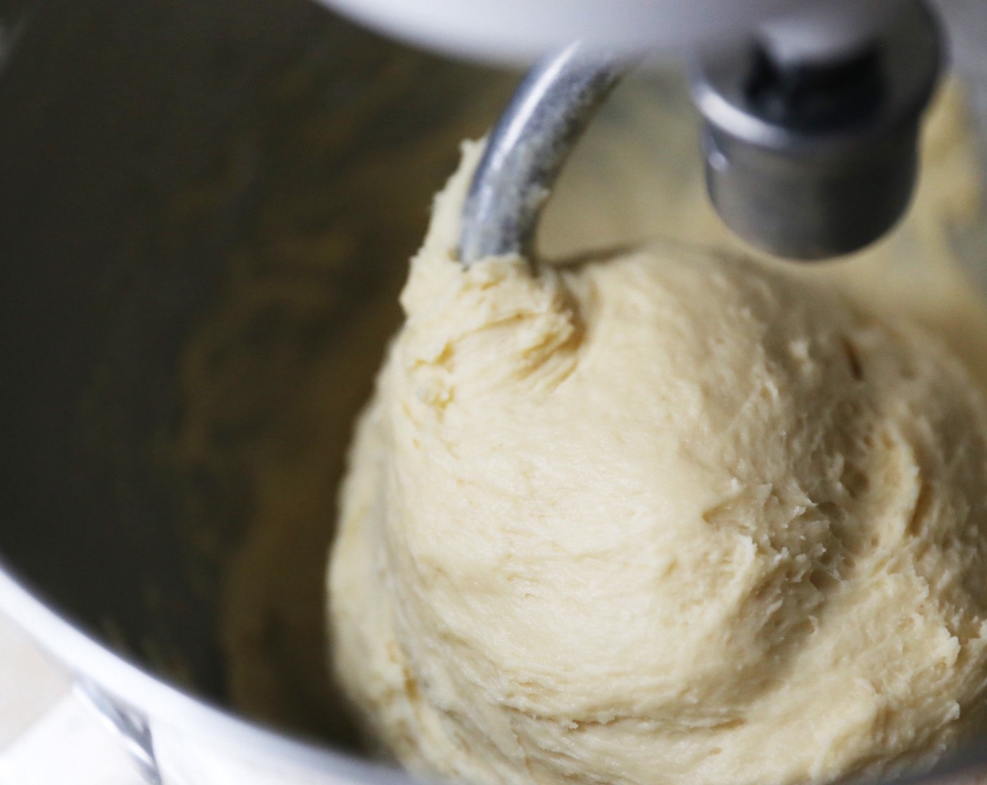 step 7 Knead for 5 minutes until the dough is smooth and elastic.