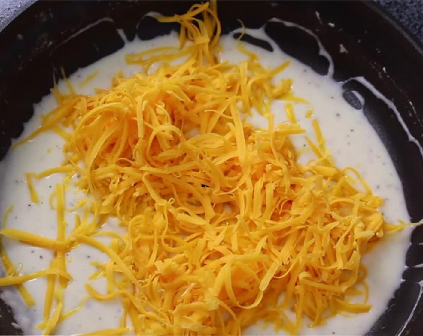 step 5 Stir in Aged Cheddar Cheese (1 cup).