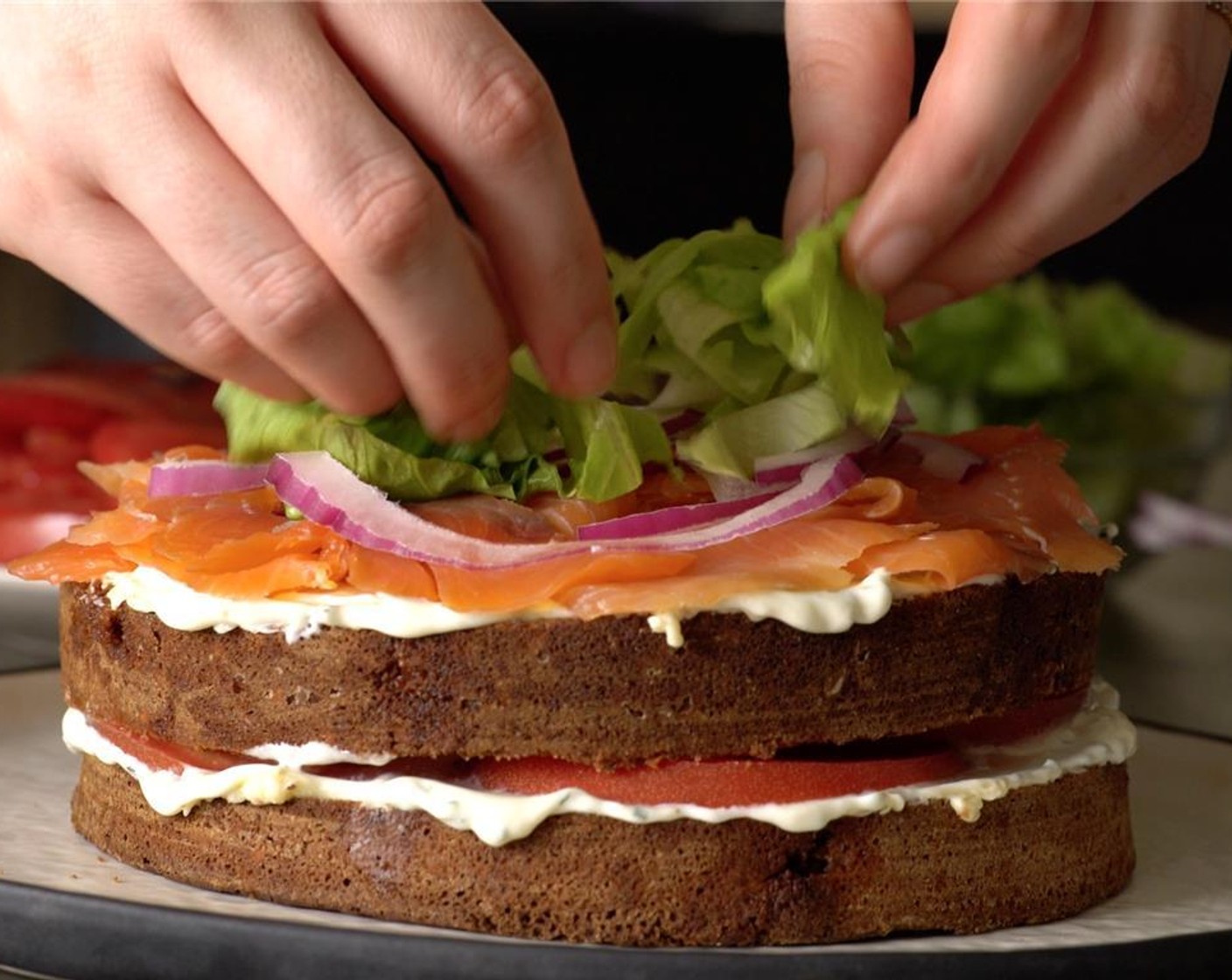 step 8 Top with Iceberg Lettuce (8 pieces) and English Cucumbers (2).