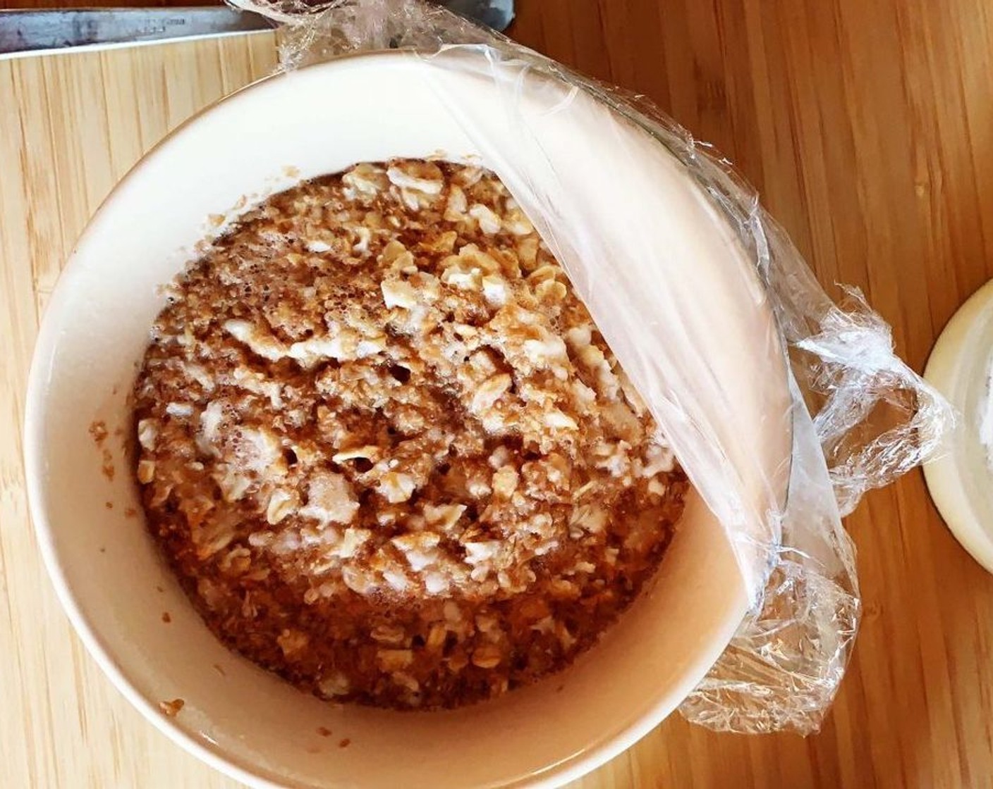 step 1 In a microwave safe bowl, combine Old Fashioned Rolled Oats (3 1/2 Tbsp), Spelt Flakes (3 1/2 Tbsp), Wheat Bran (3 Tbsp), Ground Flaxseed (1 Tbsp), and add Unsweetened Almond Milk (1/2 cup). Stir to combine then cover with plastic wrap and microwave on high for 1 1/2 minutes.