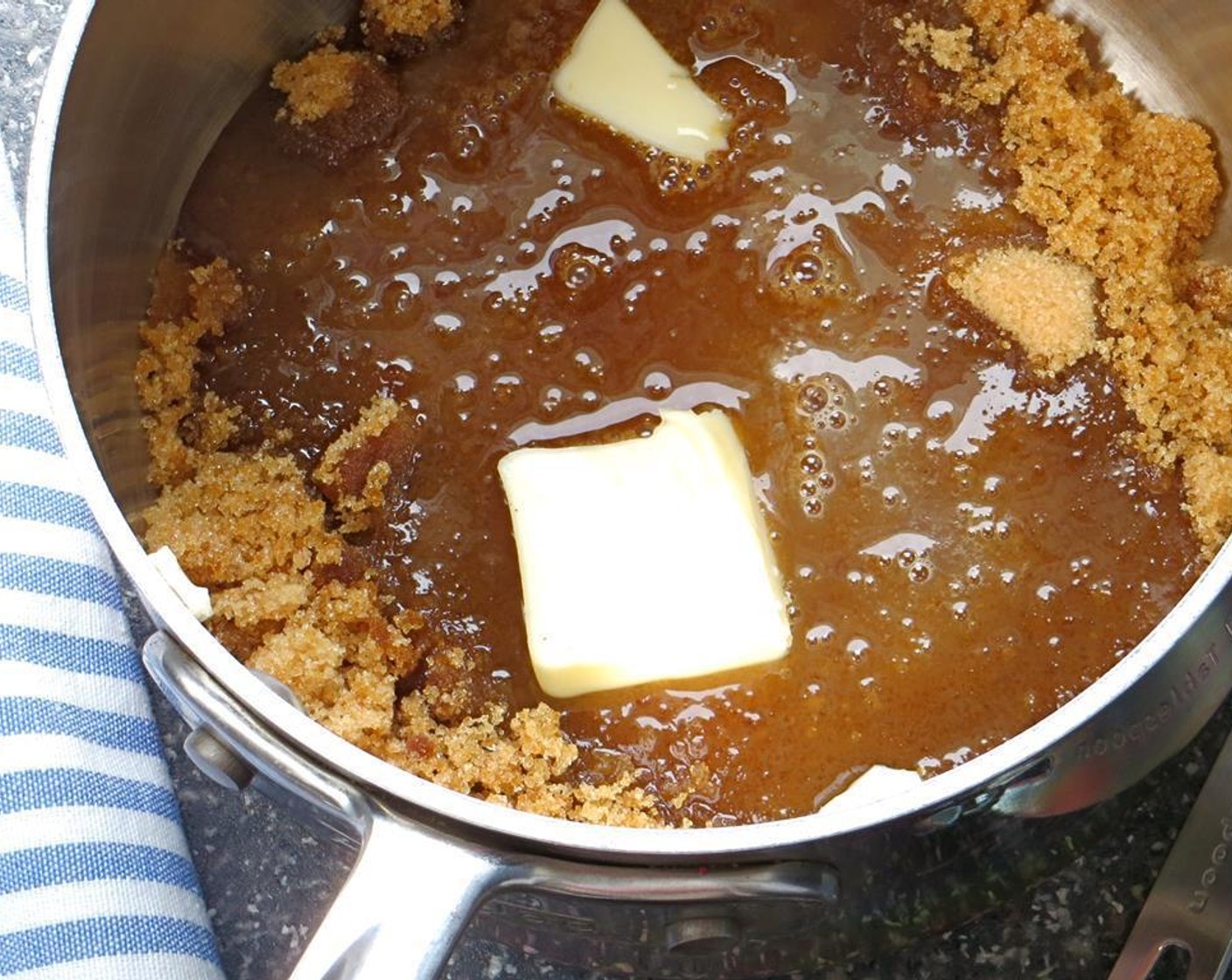 step 1 Place Brown Sugar (1 cup), Milk (2 Tbsp), Unsalted Butter (1 1/2 Tbsp), and Vanilla Extract (1 tsp) in a heavy saucepan over medium heat. Cook until the sugar is dissolved and butter is melted. Bring mixture to a boil, stirring constantly.