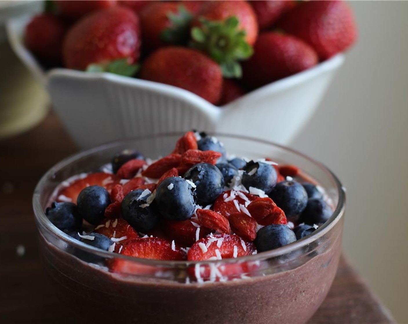 step 2 Scrape into a bowl and top with Unsweetened Shredded Coconut (2 Tbsp), Goji Berries (1 Tbsp), and Fresh Mixed Berries (1/4 cup).