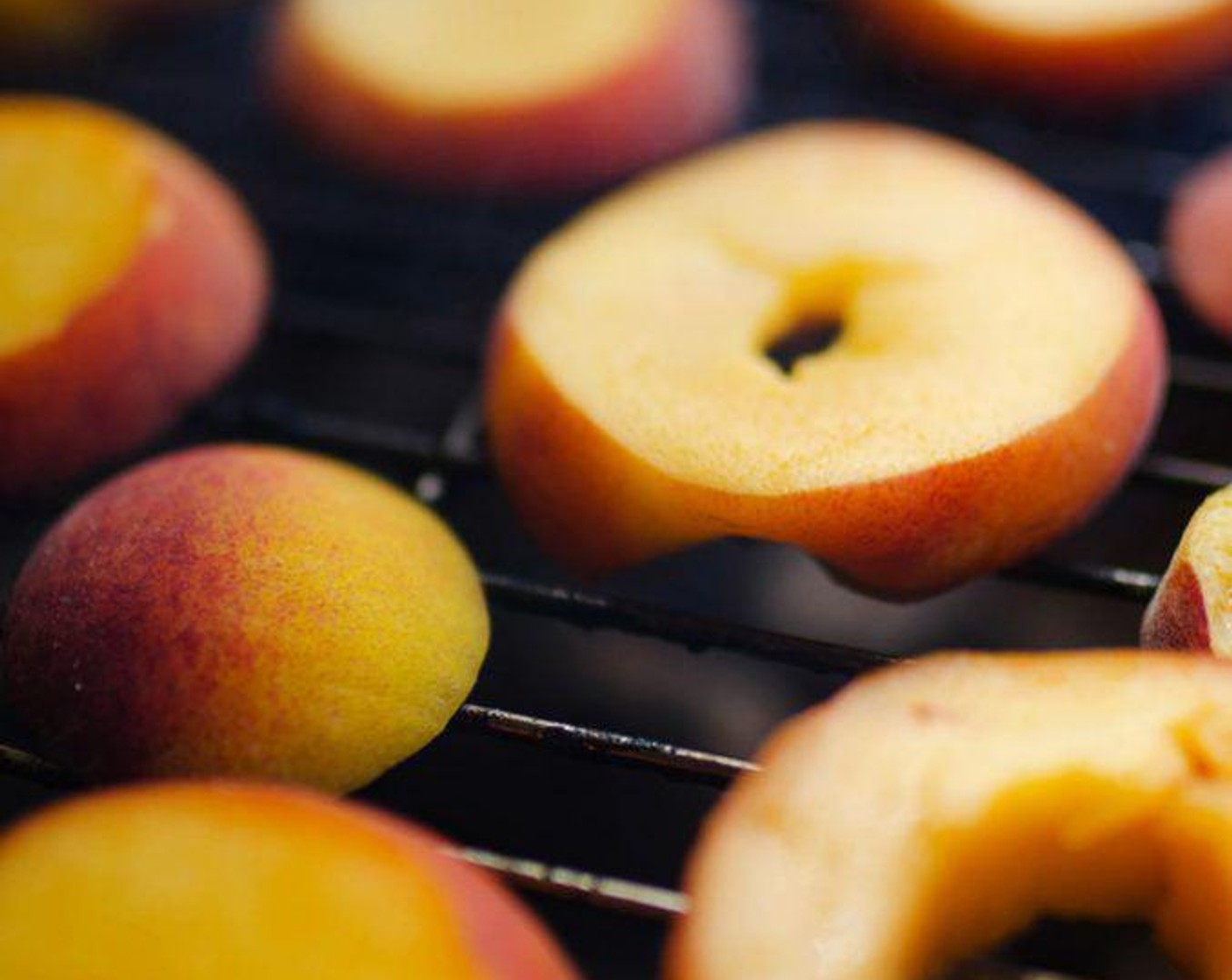 step 4 Brush peaches with Olive Oil (2 Tbsp) then grill over medium heat until charred and softened, about 5 minutes.