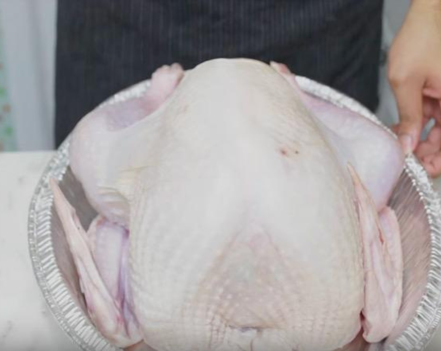 step 3 Rinse the Whole Turkey (14 lb) and pat it dry with paper towels. Place the turkey breast-side up in a roasting pan.