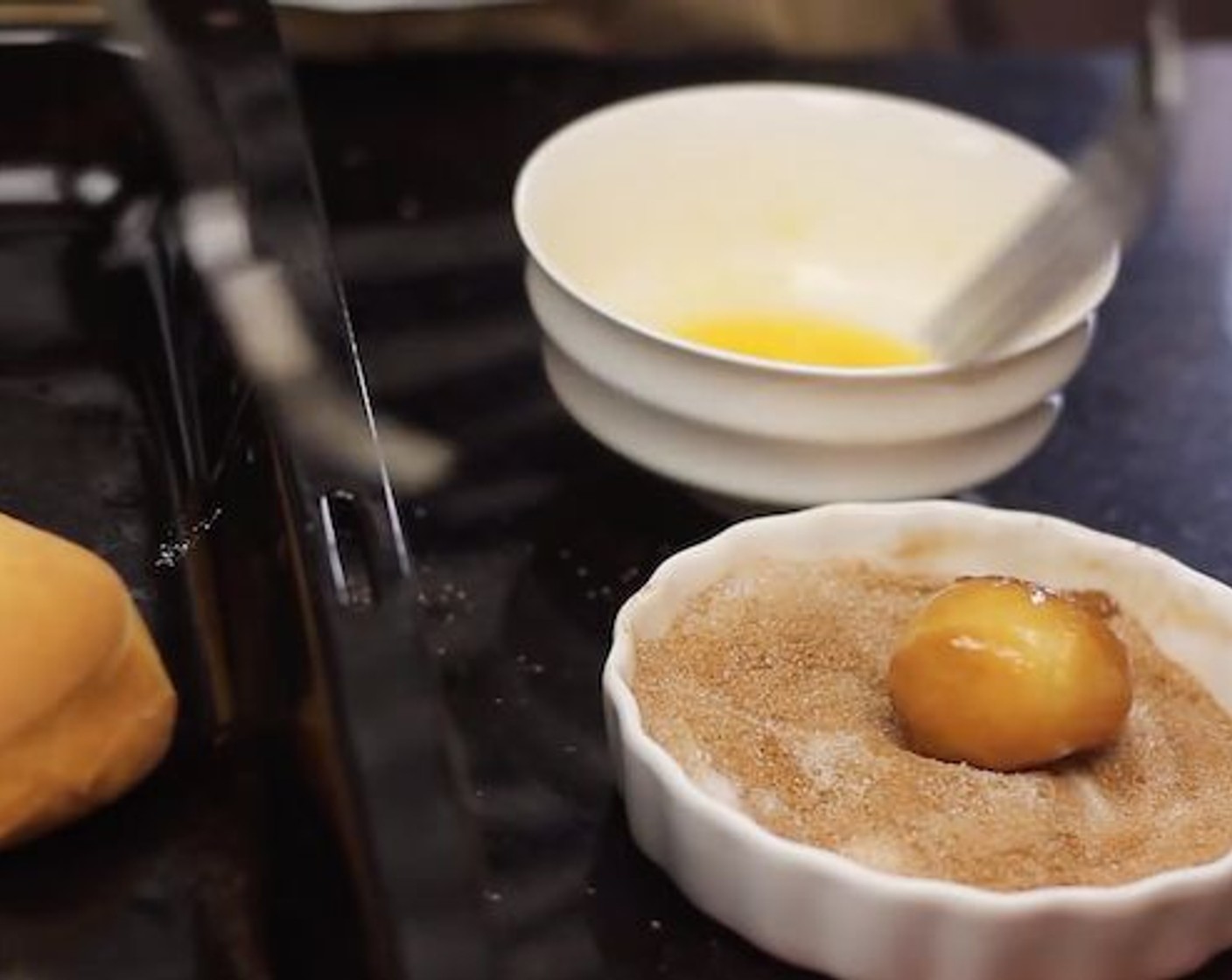 step 12 Immediately after baking, coat donut holes with butter and dust them with Ground Cinnamon (1 tsp) and Granulated Sugar (1/2 cup).