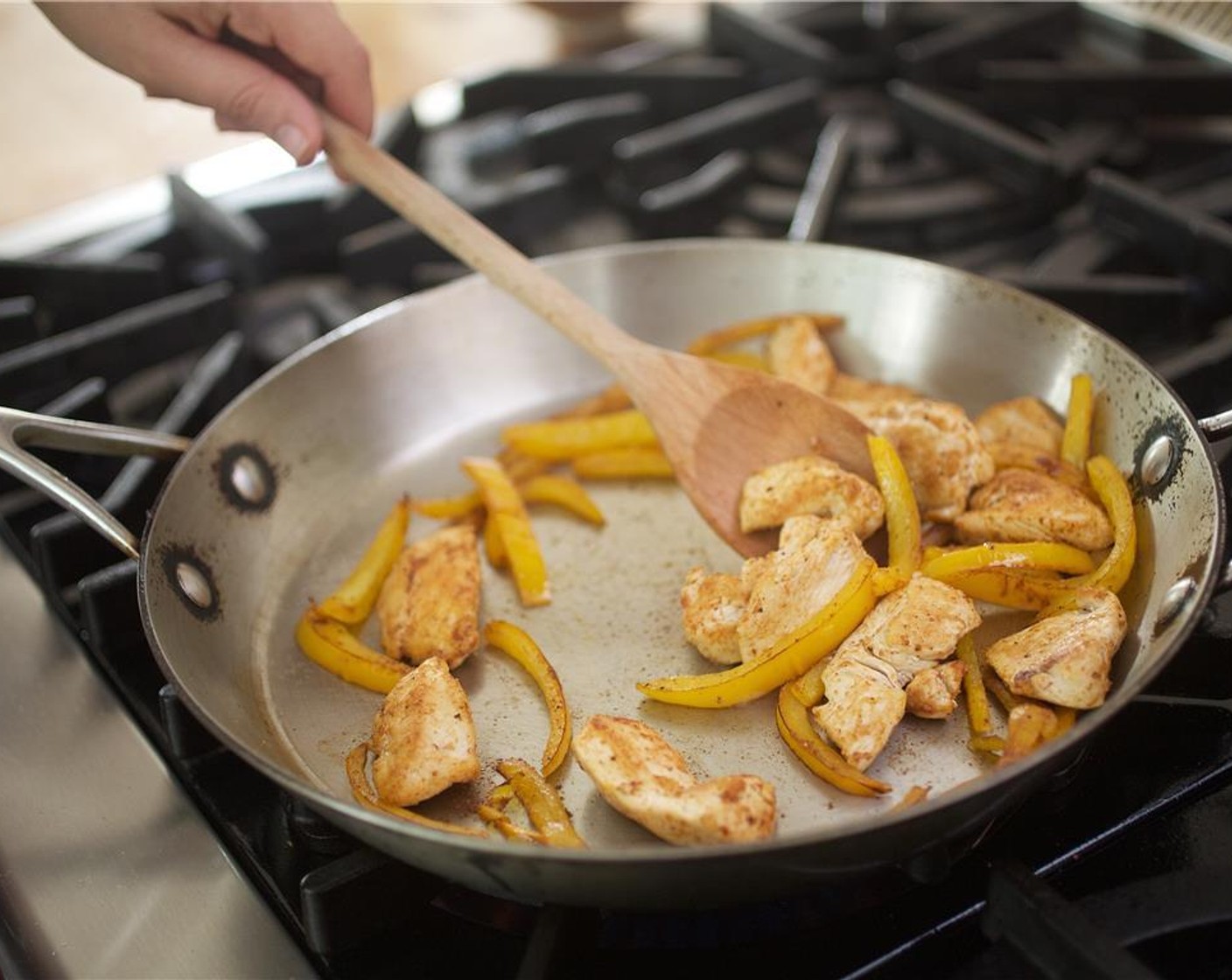 step 6 In the same saute pan, add the pepper over medium-high heat and cook for 2 minutes.