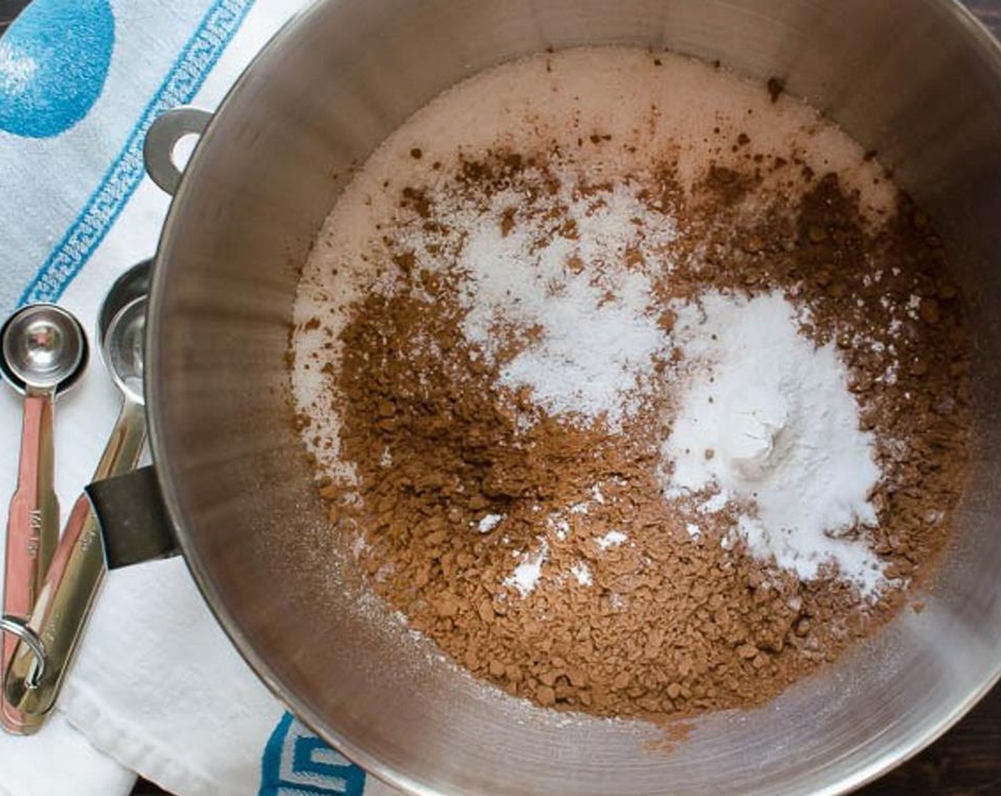 step 3 In a large bowl, combine the All-Purpose Flour (1 3/4 cups), Granulated Sugar (2 cups), Unsweetened Cocoa Powder (3/4 cup), Baking Soda (1/2 Tbsp), Baking Powder (1 tsp) and Kosher Salt (1 tsp). Whisk together until well combined.