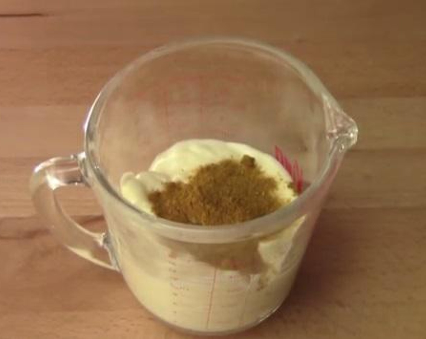 step 2 Inside a cup, mix together the Mayonnaise (1 cup), and Curry Powder (1 tsp).