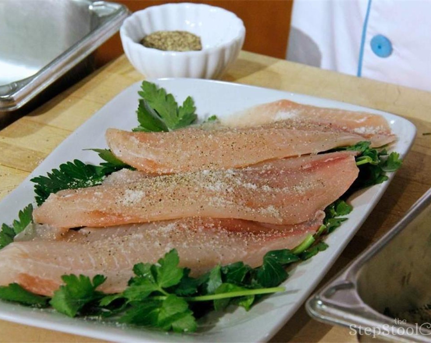 step 4 Pat the Tilapia Fillets (3) dry with a paper towel. In a dish, pour the Italian Dressing (1/2 cup) over the tilapia, and sprinkle with grated Parmesan Cheese (1 cup) Season with Salt (to taste) and Ground Black Pepper (to taste) covering the fish evenly.