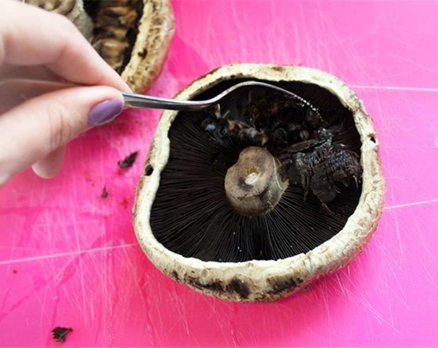 step 1 Remove the stems from the Large Portobello Mushrooms (2) and scrape the gills out.