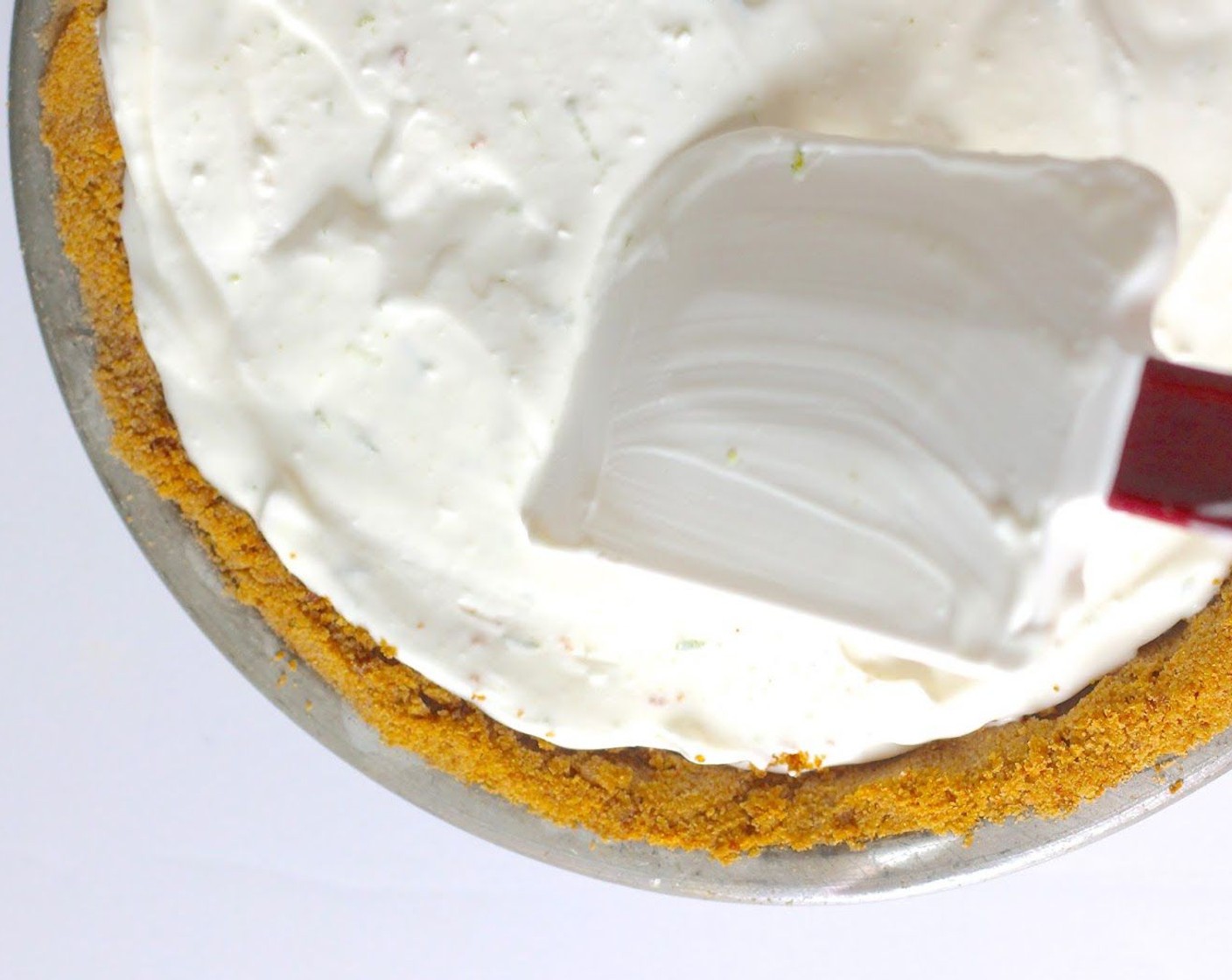 step 10 Pour the cream and yogurt mixture into the cooled pie crust.