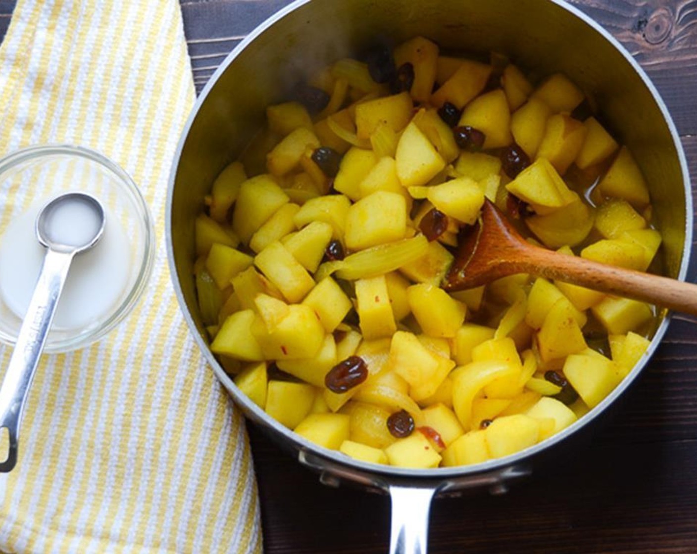 step 5 Add Apples (3), Fresh Ginger (1 tsp), Brown Sugar (1 Tbsp), Dried Cranberries (1/3 cup), and Water (1/3 cup). Cover and cook for 5 to 6 minutes until apples soften slightly and cranberries plump.