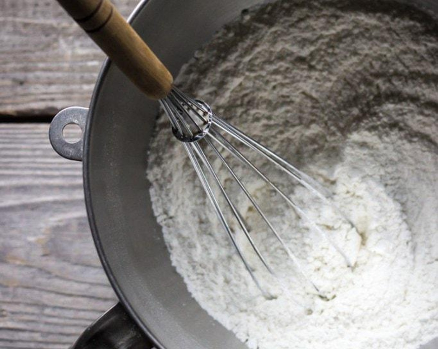 step 4 Add Gluten-Free Pastry Flour (3 cups), Cream of Tartar (1/4 tsp), and Instant Dry Yeast (1/2 Tbsp) to the bowl of a stand mixer and use a handheld whisk to combine.