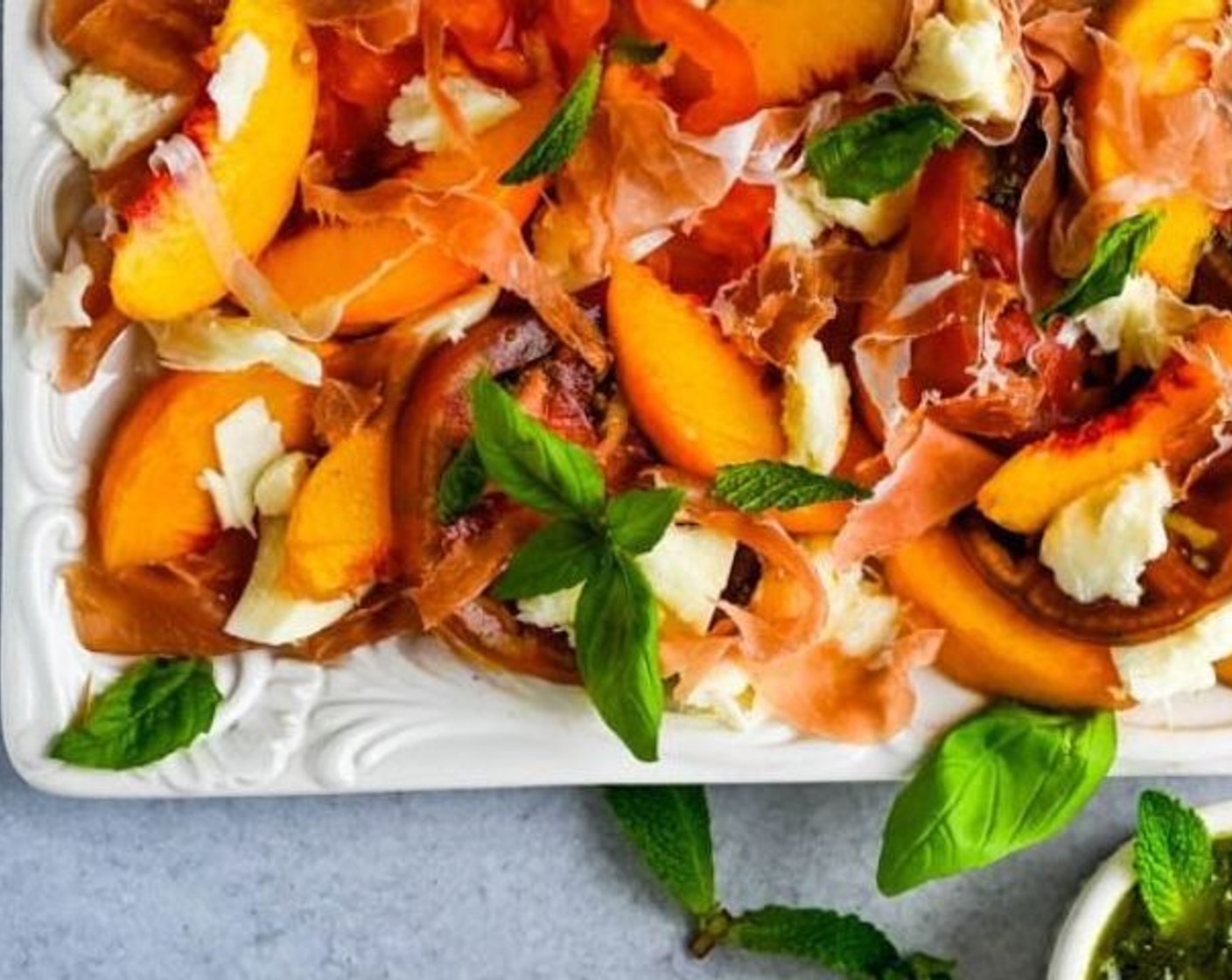 step 5 Chop or tear shards of prosciutto and scatter them over the peaches. Sprinkle with additional parsley.