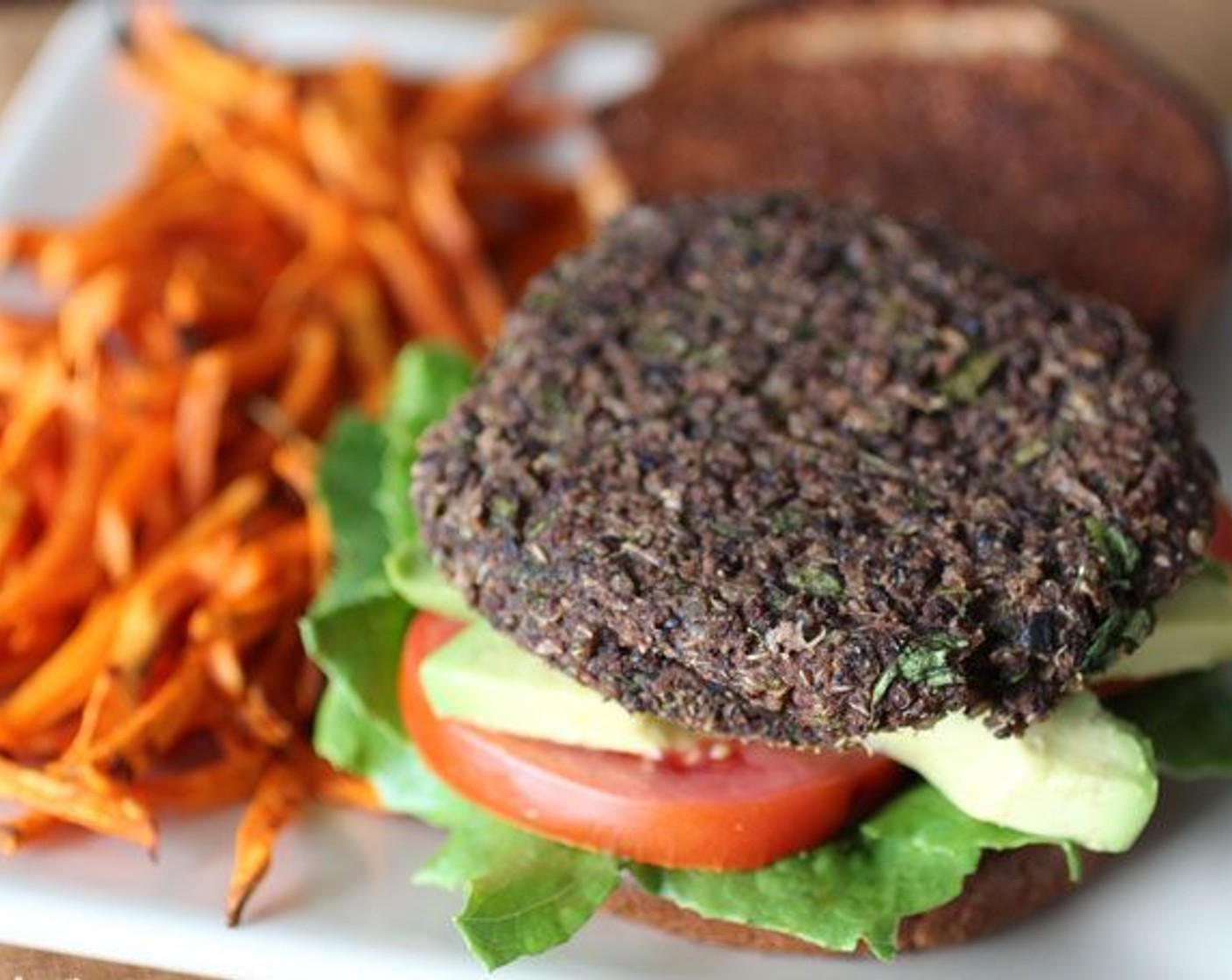 Black Bean Quinoa Burgers with Garlic Tahini Sauce