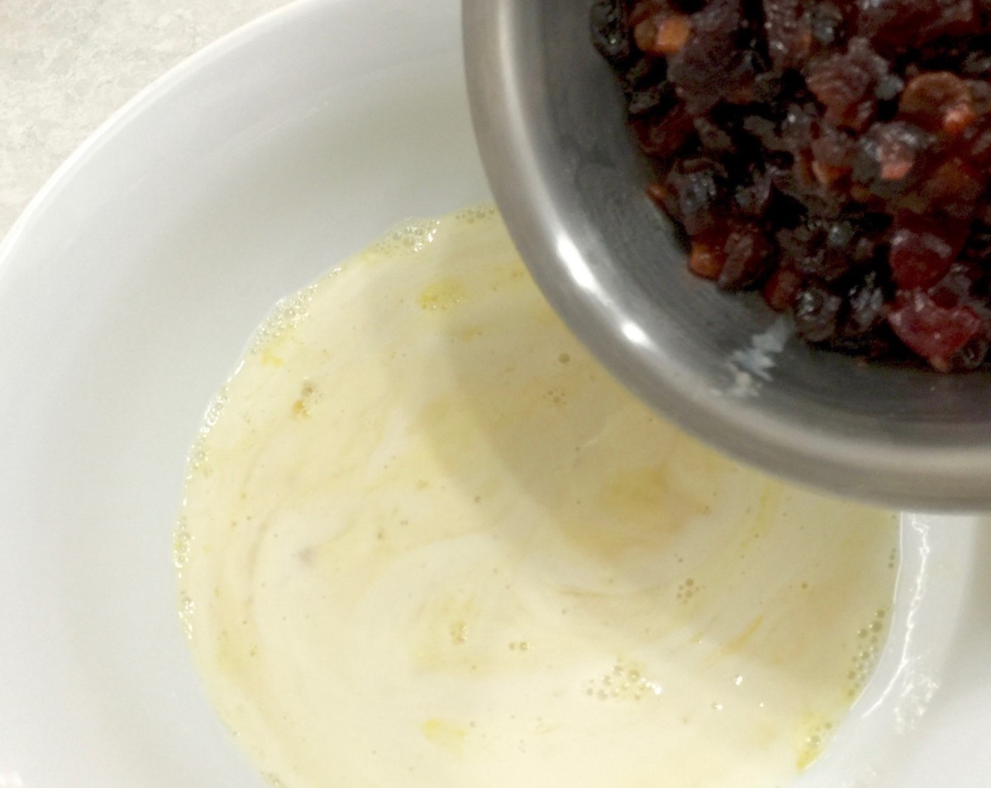 step 14 Next, add in the spiced Fresh Fruits (1 1/2 cups) mince. Mince fruit adds sweetness and moisture to the muffin batter.