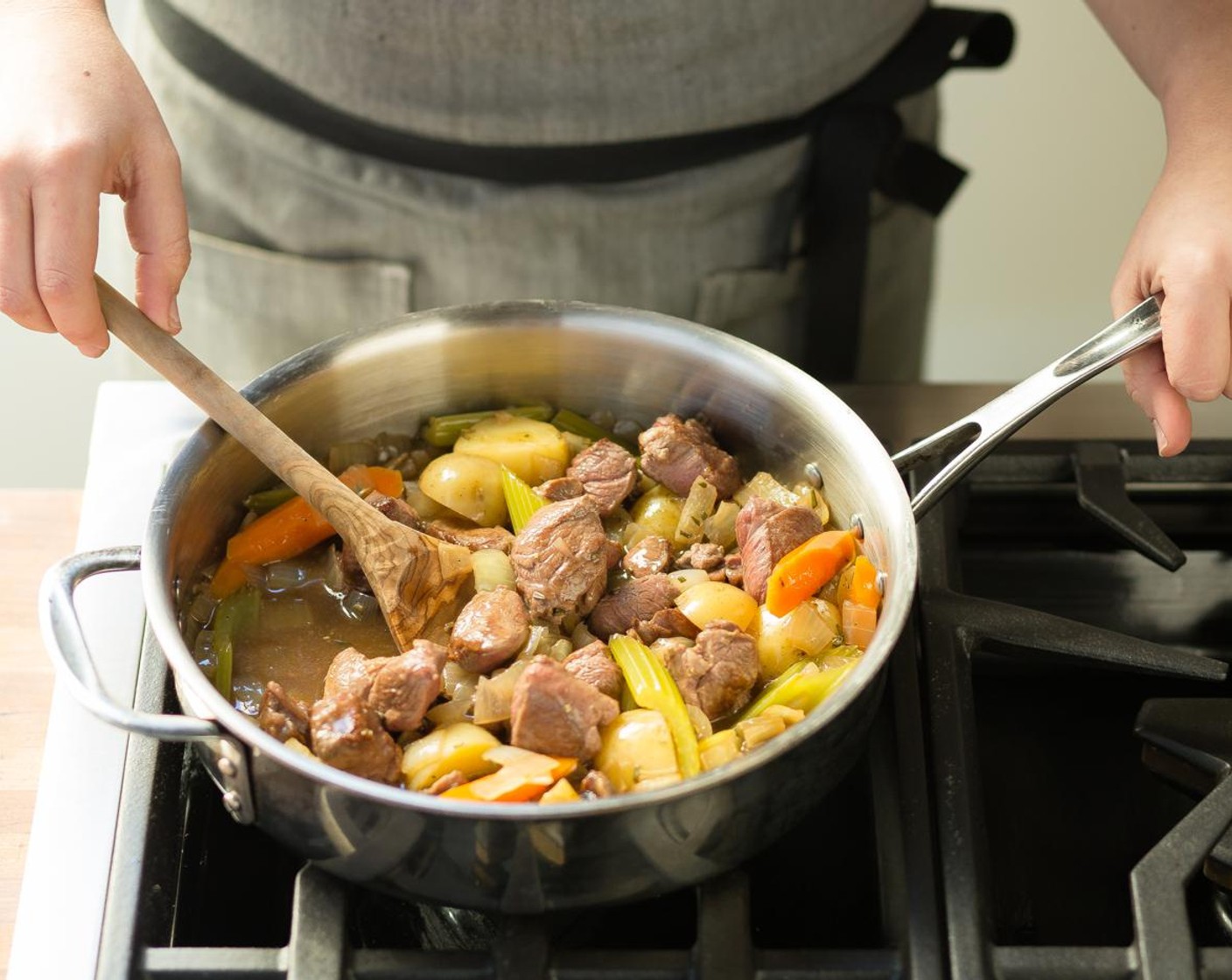 step 10 Return lamb to the pan and cover. Simmer until lamb is tender for about 30 minutes. Season with Salt (1/2 tsp) and Ground Black Pepper (1/4 tsp). Stir in parsley just before serving.