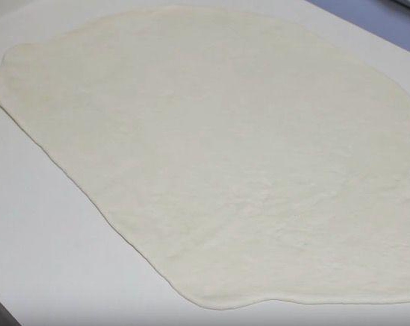 step 1 Roll out Pizza Dough (1 pckg) into a 13 by 15-inch rectangle.