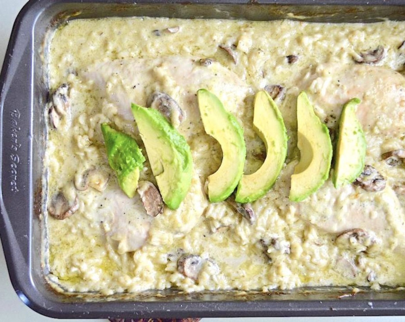 step 5 When the casserole is done, place the Avocados (to taste) on top and serve immediately!