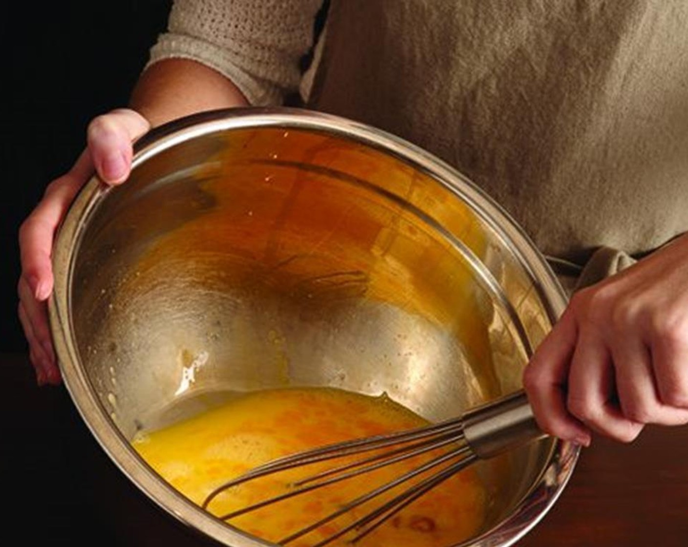 step 4 In a large bowl, scramble the Eggs (15) and season with Kosher Salt (1 Tbsp) and Ground Black Pepper (1 tsp). Pour into prepared skillet.