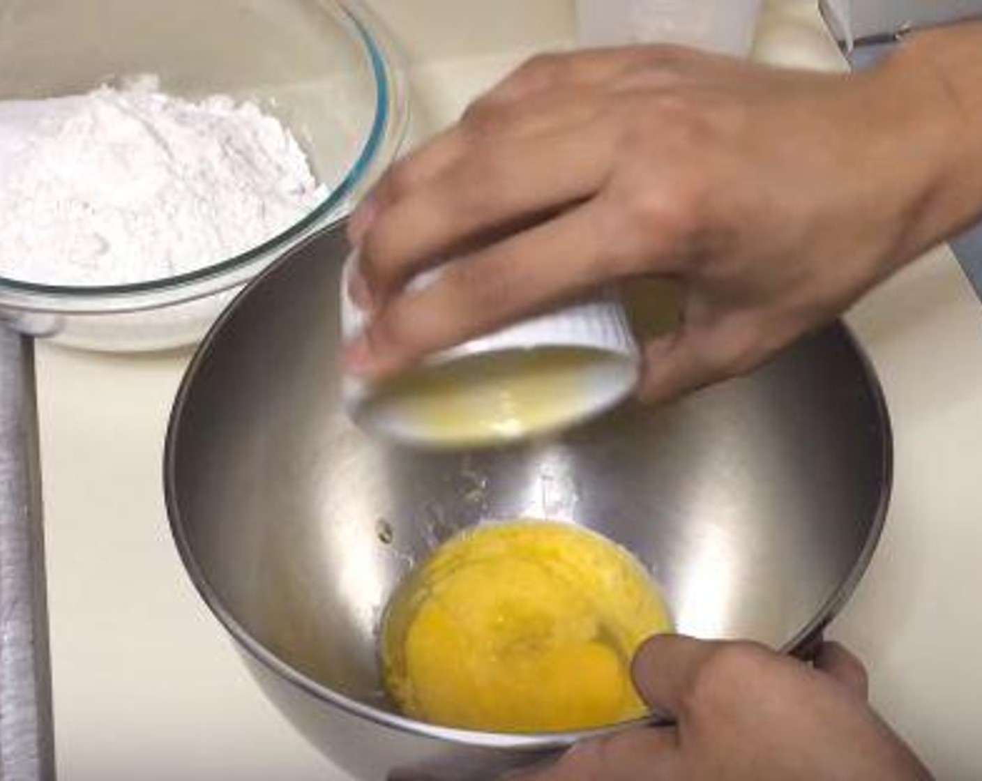 step 3 In another bowl, whisk together the Eggland's Best Classic Egg (1) and the Butter. Add the yeast-milk and beat together.