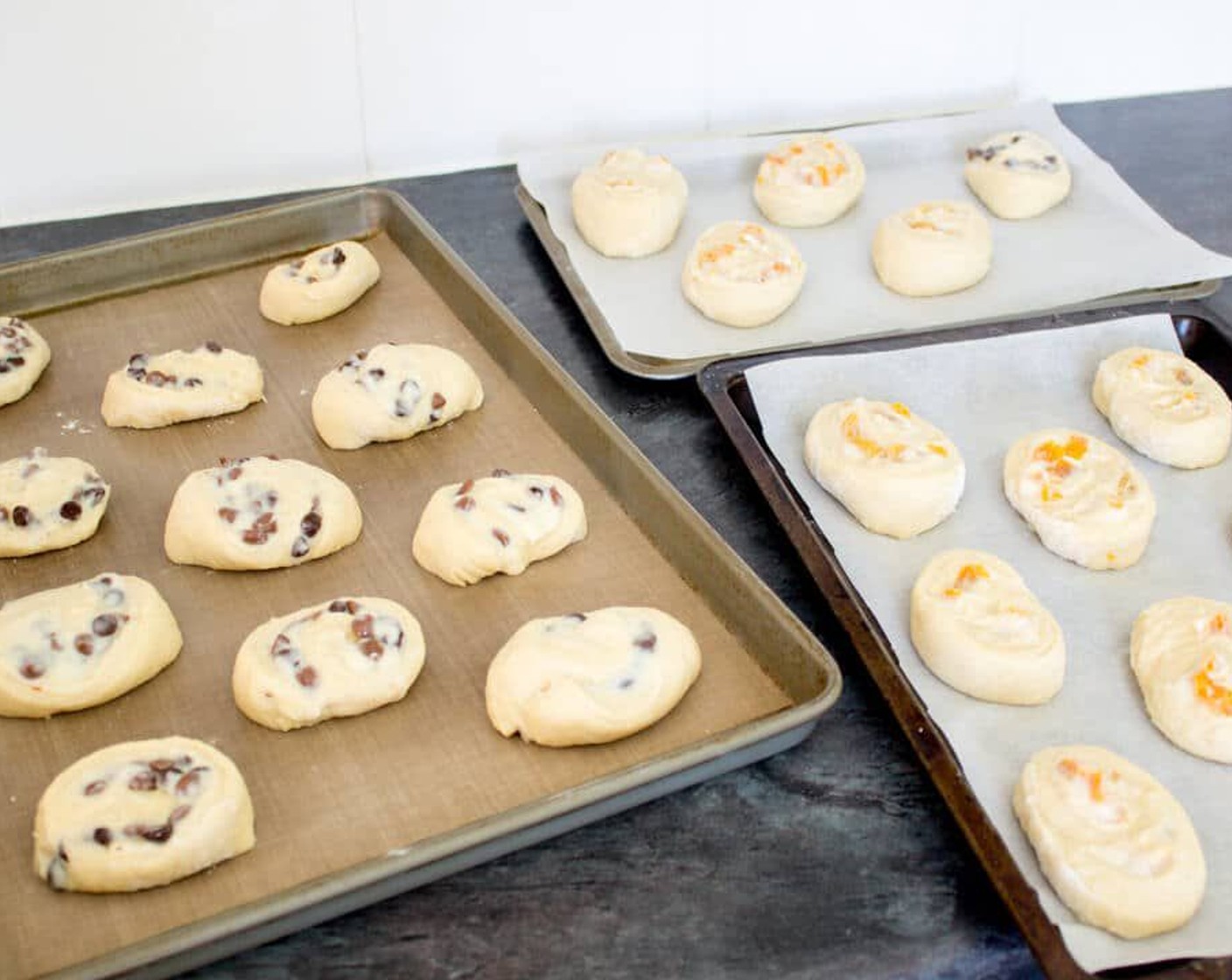 step 25 Lay the pastries cut side up on lined baking sheets. Allow a bit of room between each one for spreading. Cover with large plastic bags and prove for about 2 hours until at least doubled in size.