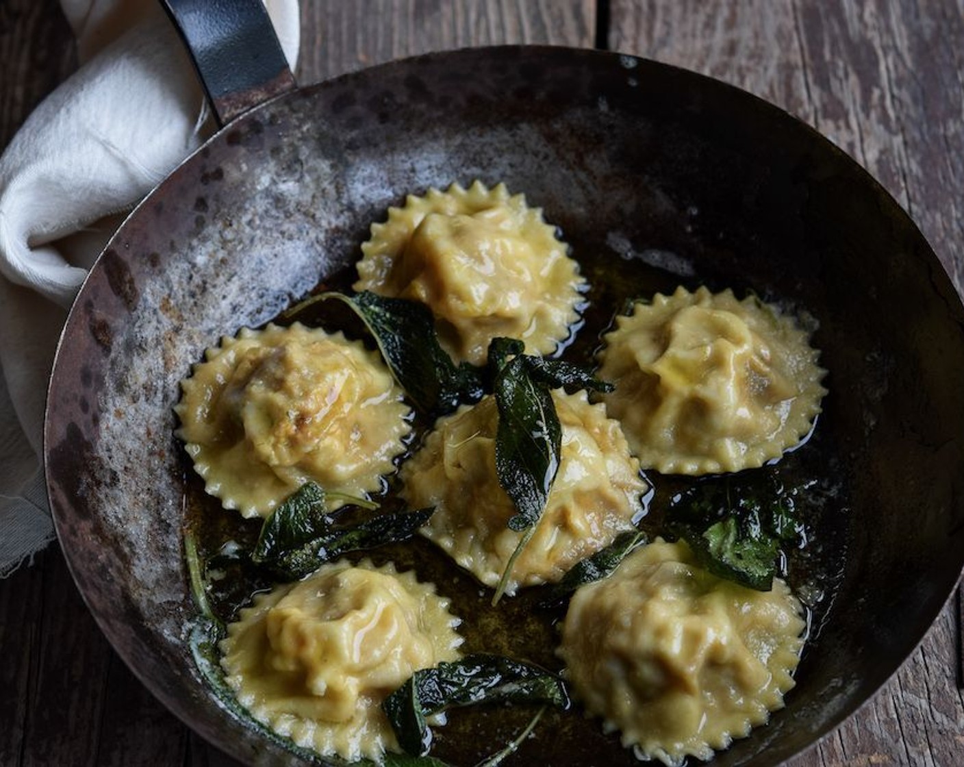 step 13 Drain the ravioli. Plate the pasta in hot bowls, spoon over the sauce and add Parmesan Cheese (to taste) and a final drizzle of olive oil.