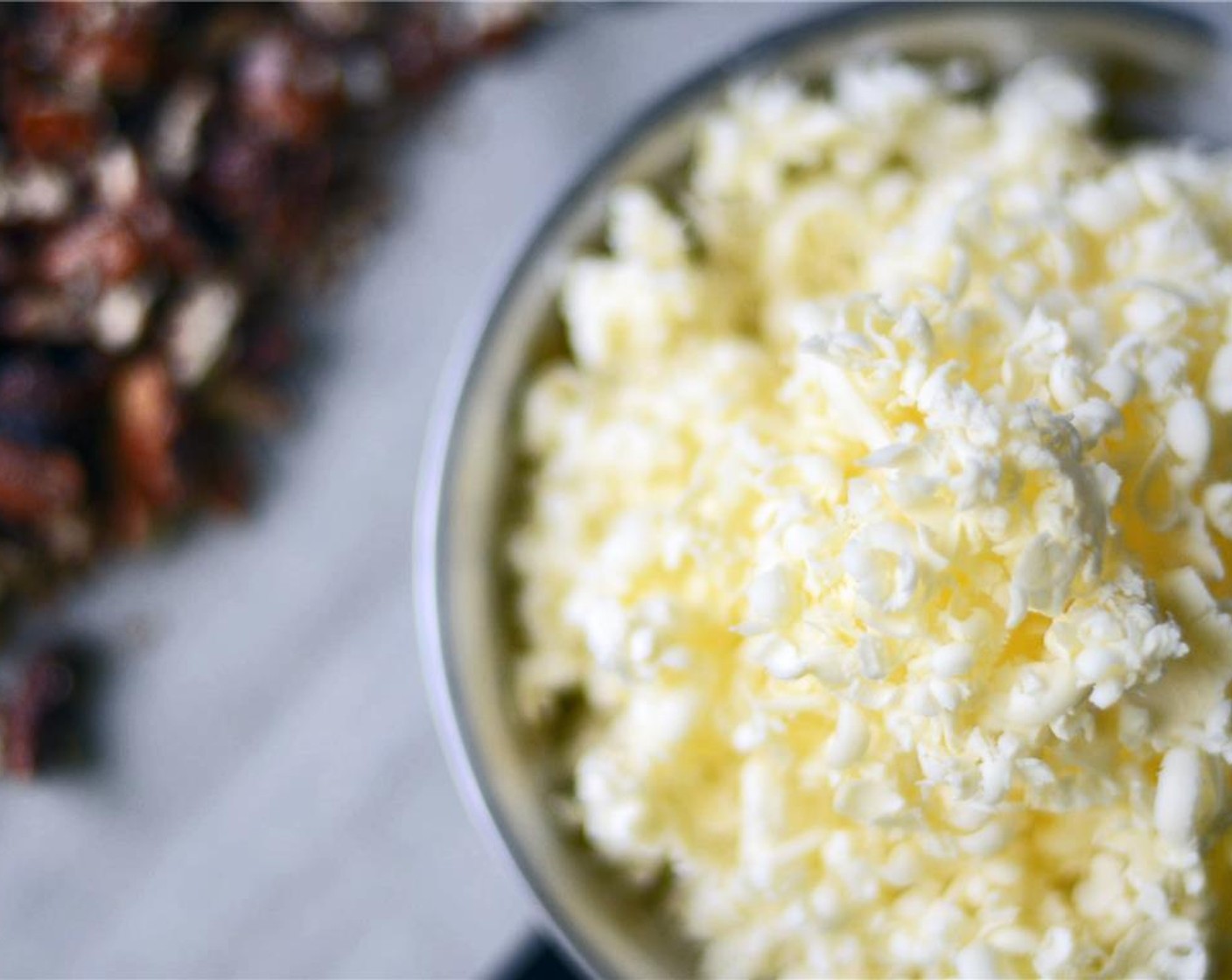 step 4 Grate Unsalted Butter (3/4 cup) into dry ingredients. If the butter becomes too soft, pop everything in freezer for 10 minutes and then continue on. Toss together butter and flour, it will resemble coarse meal.