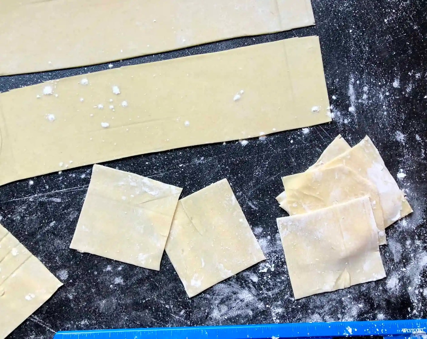 step 7 Lightly dust your countertop with Corn Starch (as needed) starch and roll half of the dough as thin as you can. The rectangle should be about 20x10-inch if you are cutting 5-inch wrappers or 15x9-inch if you are cutting 3-inch wrappers.