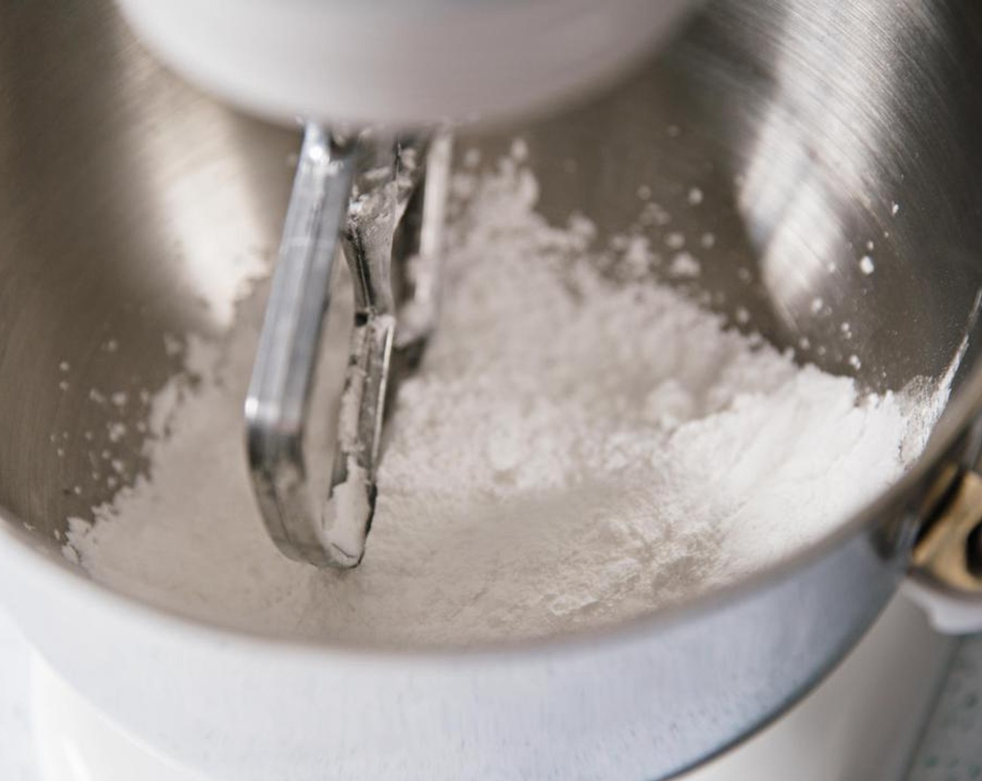 step 1 Place Powdered Confectioners Sugar (3 1/3 cups) in the bowl of a stand mixer.