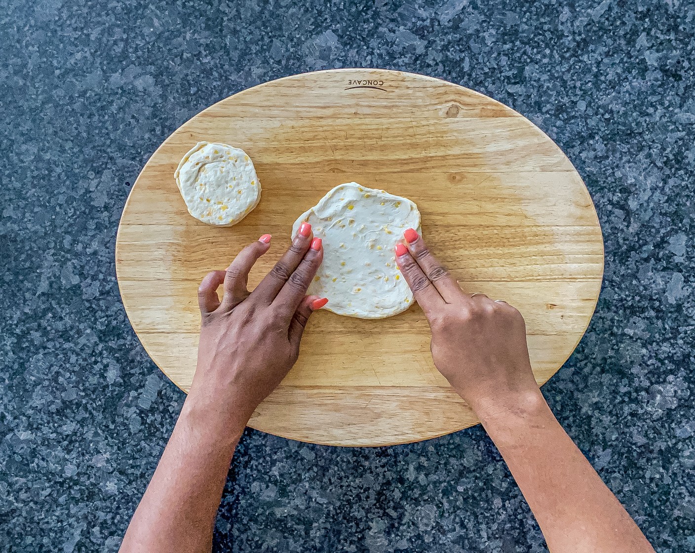 step 2 Separate each Buttermilk Biscuits (2 cans). Use fingers to stretch and flatten biscuits to 4-5 inches.