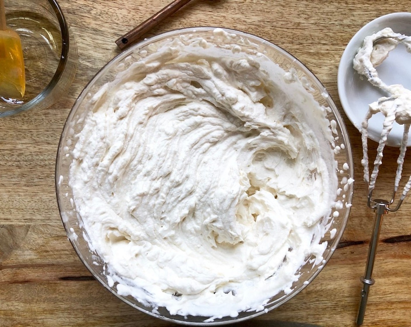 step 2 Meanwhile, prepare the Maple Whipped Cream. In the bowl of an electric mixer fitted with the whisk attachment, beat together the Heavy Cream (1 cup), Pure Maple Syrup (4 Tbsp), and Salt (1/4 tsp) until soft peaks form. Cover and refrigerate until ready to use.