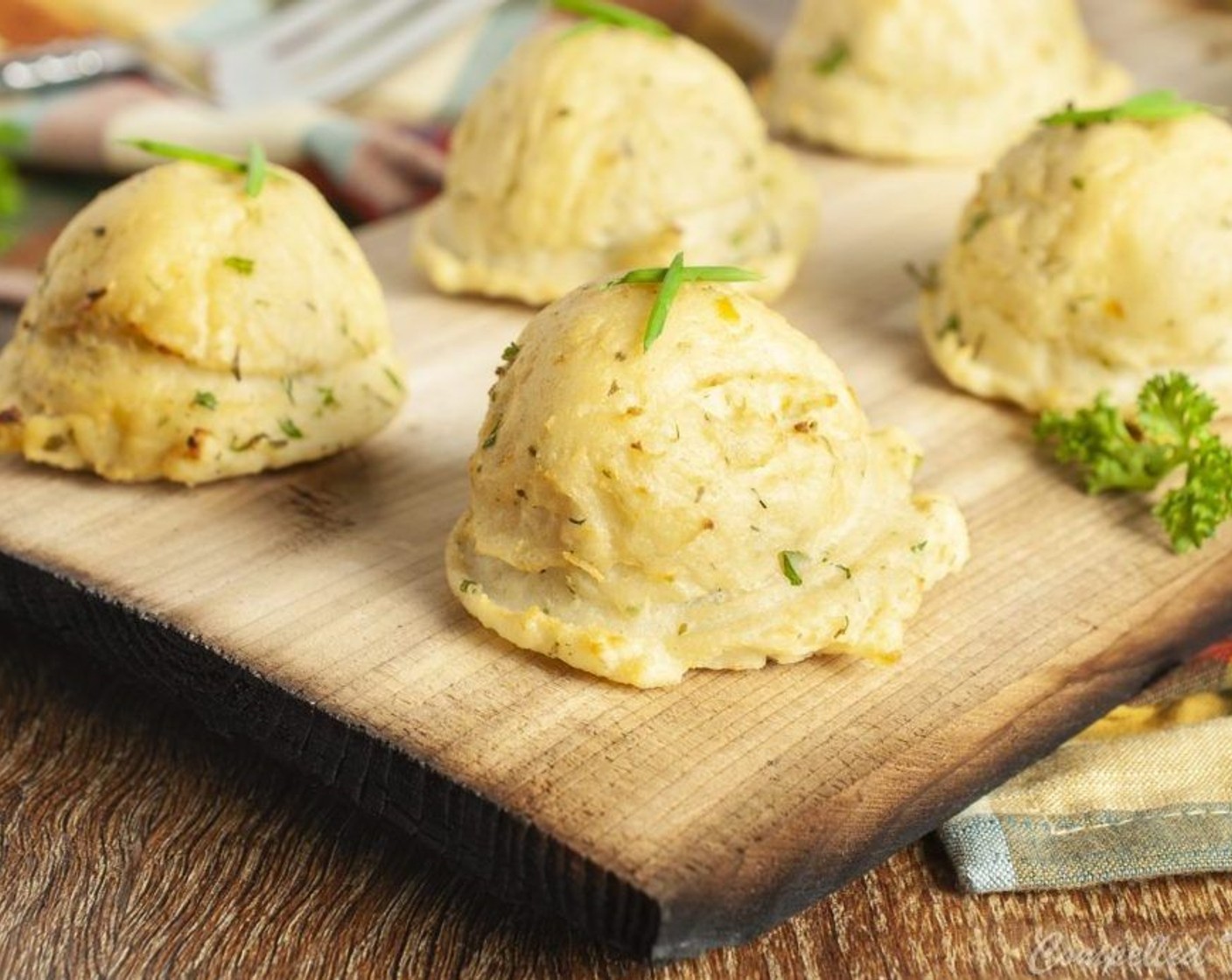 step 7 Remove planks from grill and use to serve potatoes or gently place potatoes onto serving dish and garnish with additional fresh herbs if desired. Enjoy!