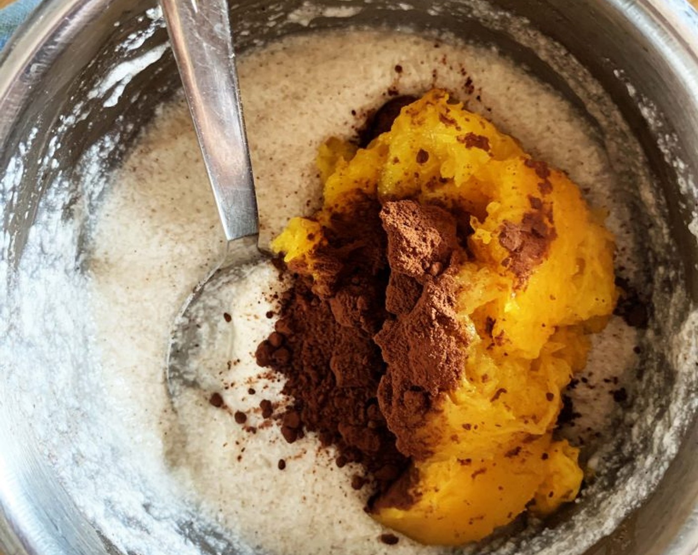 step 2 Add in the Pumpkin Purée (1/2 cup) and Cacao Powder (1 2/3 Tbsp).
